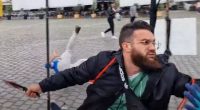 A man attacking people with a knife.