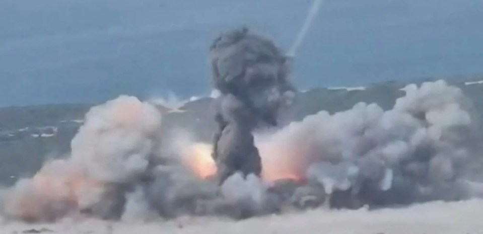 Missile impact at sea during Iranian military exercises.