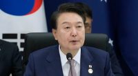 South Korean President Yoon Suk Yeol speaking at a summit.