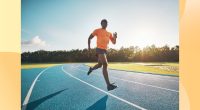 fit, athletic man spring on track on sunny day