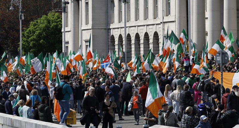Thousands march in Dublin against Ireland's mass migration policies as McGregor pursues presidential bid