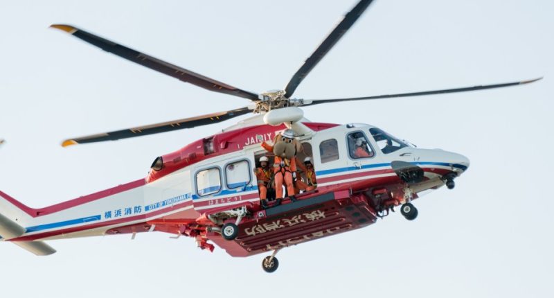 Yokohama fire station rescue helicopter in flight.