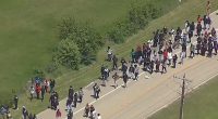 Three students shot in shooting at Dallas high school over dice game