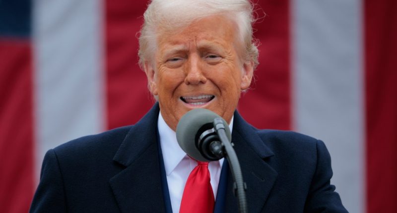 President Donald Trump speaking at a podium.