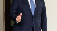 President Donald Trump giving a thumbs-up.