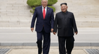 Donald Trump and Kim Jong Un walking together.