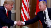 President Trump and President Putin shaking hands.
