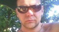 Photo of a man wearing sunglasses.