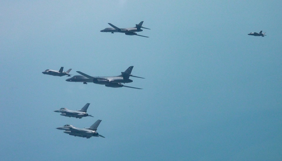 US and South Korean fighter jets and bombers flying in formation.