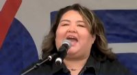 Undocumented migrant taunts Trump with her status at Hands Off rally