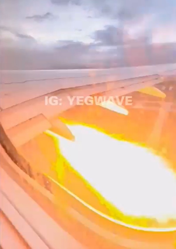 Airplane wingtip fire.