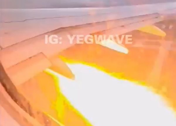 Airplane wingtip fire.