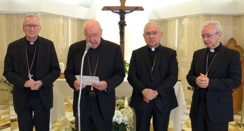 Cardinal Kevin Farrell and other Vatican officials announce the death of Pope Francis in a video statement, at the Vatican, April 21, 2025. Vatican Media/?Handout via REUTERS ATTENTION EDITORS - THIS IMAGE WAS PROVIDED BY A THIRD PARTY. TPX IMAGES OF THE DAY
