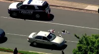 Virginia police officers shot during traffic stop near popular shopping center; suspect arrested