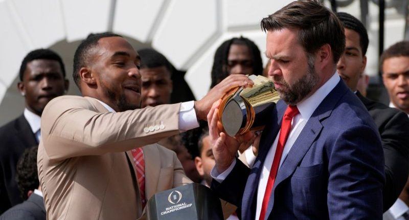 WATCH: College football trophy comes apart in Vance's hands at White House