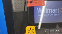 Walmart self-checkout card reader with a new label.