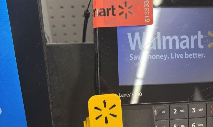 Walmart self-checkout card reader with a new label.