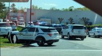 Police cars outside a Walmart.