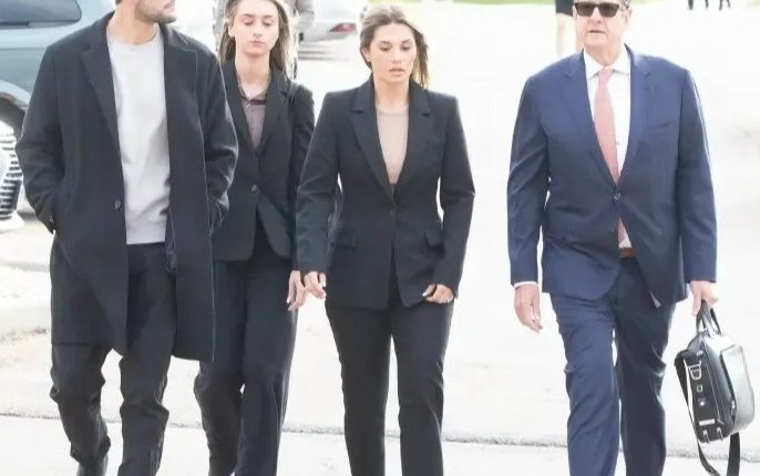 Christina Formella and her husband arriving at court.