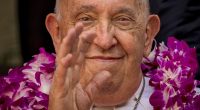 Pope Francis waving to well-wishers.