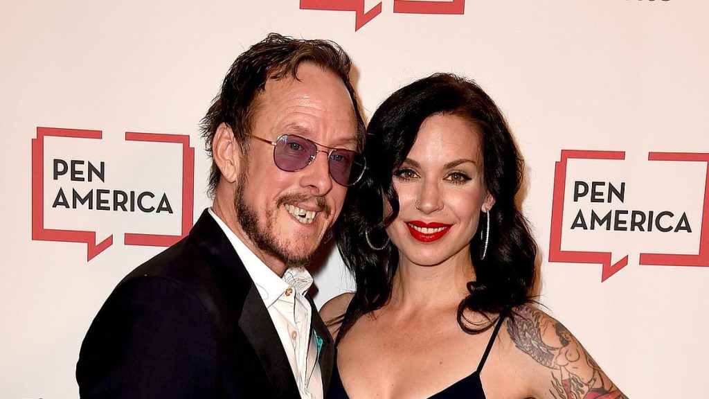 Wild moment cops shoot 90s rocker's wife after car chase