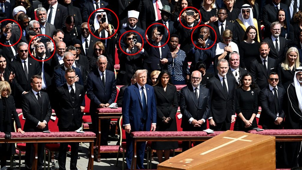 World leaders are spotted taking photos of Pope Francis' coffin