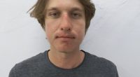 Arrest photo of Mykhailo Polyakov.