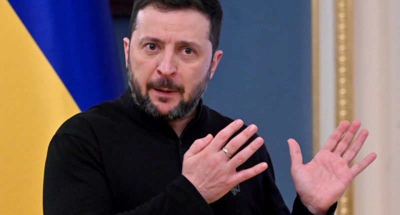 Volodymyr Zelensky speaking at a press conference.