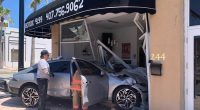 2 injured, 1 as trauma alert, after car crashes into Daytona Beach business