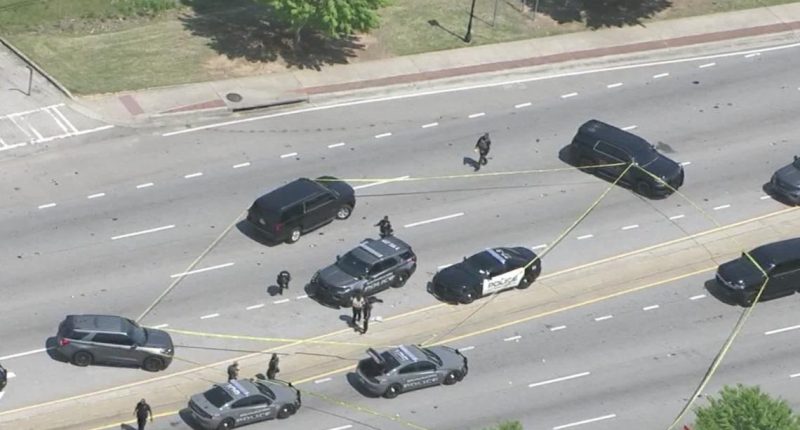 2 officers hurt, suspect dead after shooting on Fulton Industrial Blvd