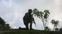 3 Haitian soldiers warring with gangs are slain outside of Port--au-Prince