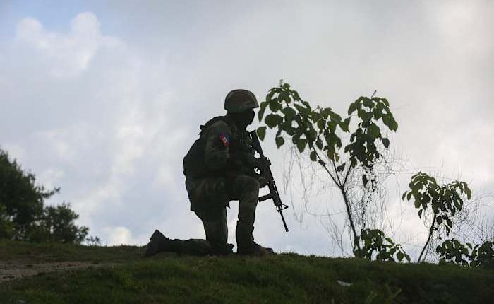 3 Haitian soldiers warring with gangs are slain outside of Port--au-Prince