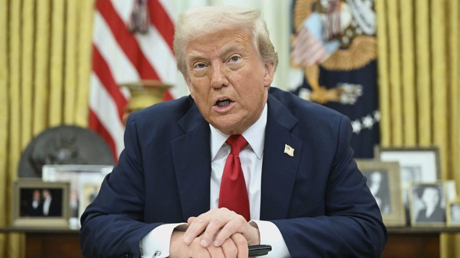 President Trump speaks to reporters before signing an executive order in the Oval Office of the White House in Washington on March 31, 2025. (Associated Press pool)