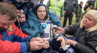 A Soyuz capsule with 2 Russians and 1 American returns to Earth from the International Space Station