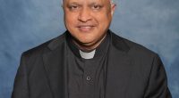 A man has shot and killed a Catholic priest at his parish rectory in northeast Kansas