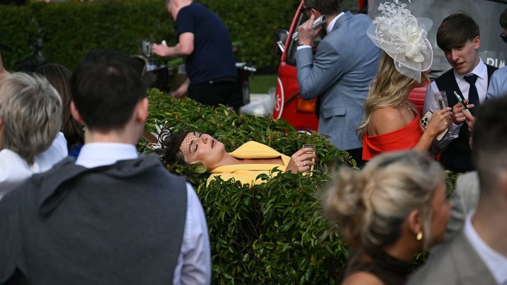 Aintree revellers get the party started as they don backless dresses and fabulous fascinators to sip on prosecco ahead of Ladies Day