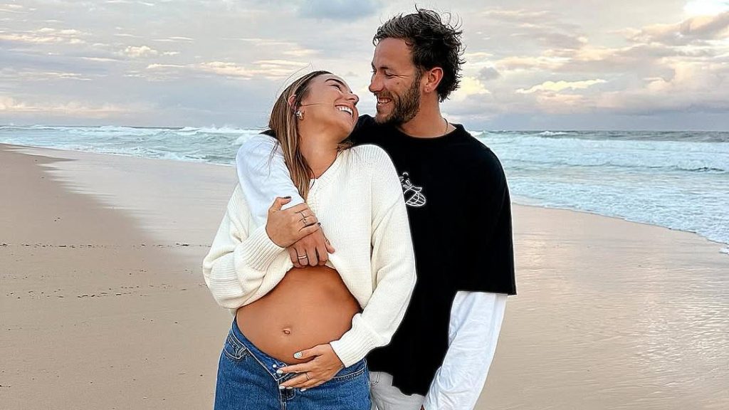 Alex McKinnon's ex wife posts amazing video of the moment her romance with her new man went to the next level - just after footy star declared his love for his girlfriend