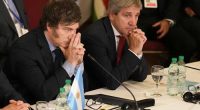 Argentina says it will lift the country's strict currency controls with help from the IMF