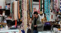 China lowers minimum amount for tax refunds for tourists to boost spending
