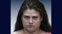 Daughter who killed dad, stabbed mom, gets 2 life sentences
