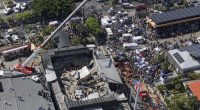 Rescue workers search for survivors at the Jet Set nightclub after its roof collapsed during a merengue concert in Santo Domingo, Dominican Republic, Tuesday, April 8, 2025. (AP Photo/Eddy Vittini)