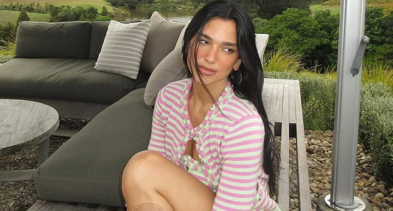 Dua Lipa stuns in a striped co-ord as she enjoys a family day out to a winery ahead of sold-out New Zealand tour