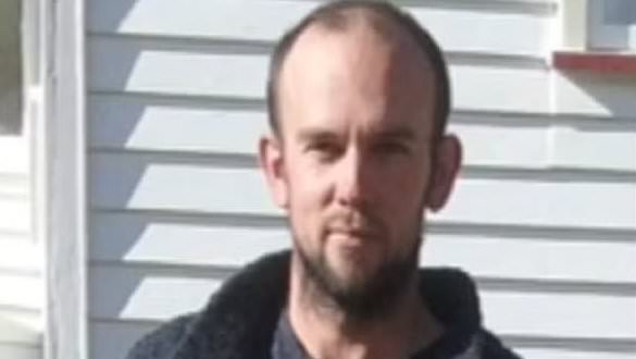 Huge twist in the manhunt for dad on the run with his three kids as armed police swoop on a home near where he allegedly robbed a bank