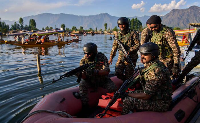 Indian military says Pakistani troops fired at positions along border in disputed Kashmir overnight