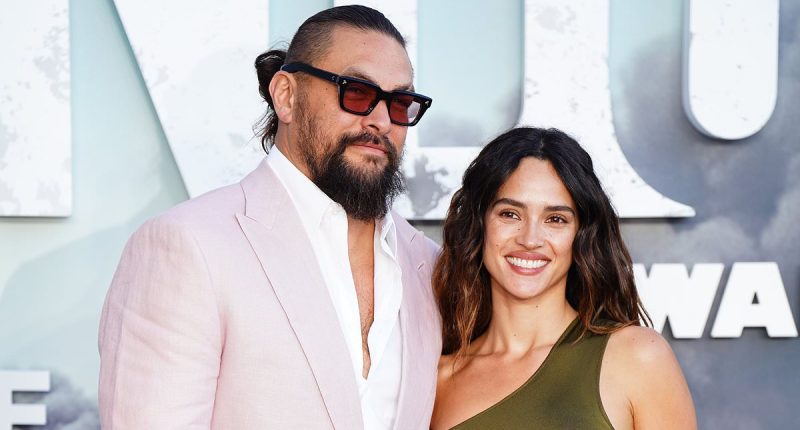 Jason Momoa, 45, and girlfriend Adria, 32, look smitten at premiere