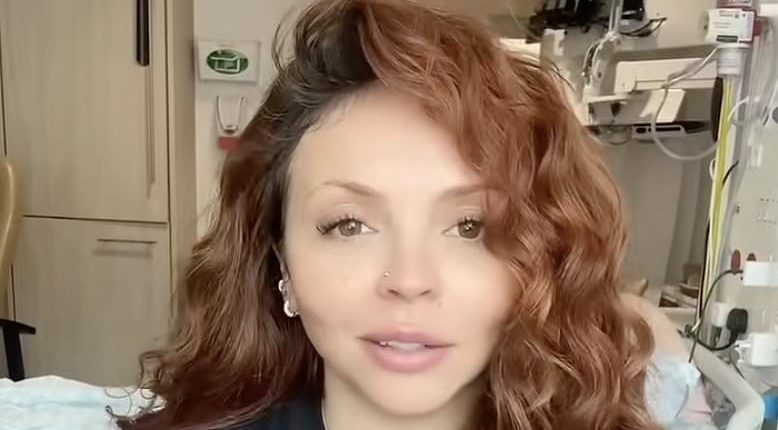 Jesy Nelson gives pregnancy update from hospital bed and shows off her growing bump after undergoing emergency surgery to save unborn twins