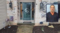 Man finds woman from car accident, spray paints home: Cops