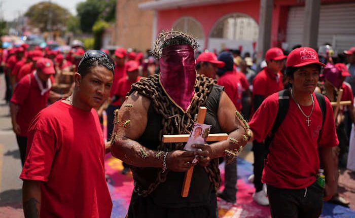 Mean toting chains and pierced with cactus keep a Good Friday tradition in Atlixco, Mexico