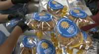 Pockets Full of Sunshine baking cookies for race, with love