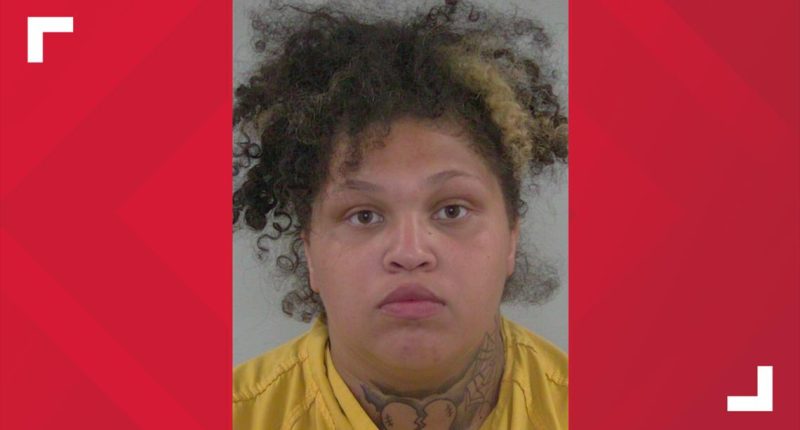 Police: Woman arrested for pointing gun at individuals at Lake City intersection